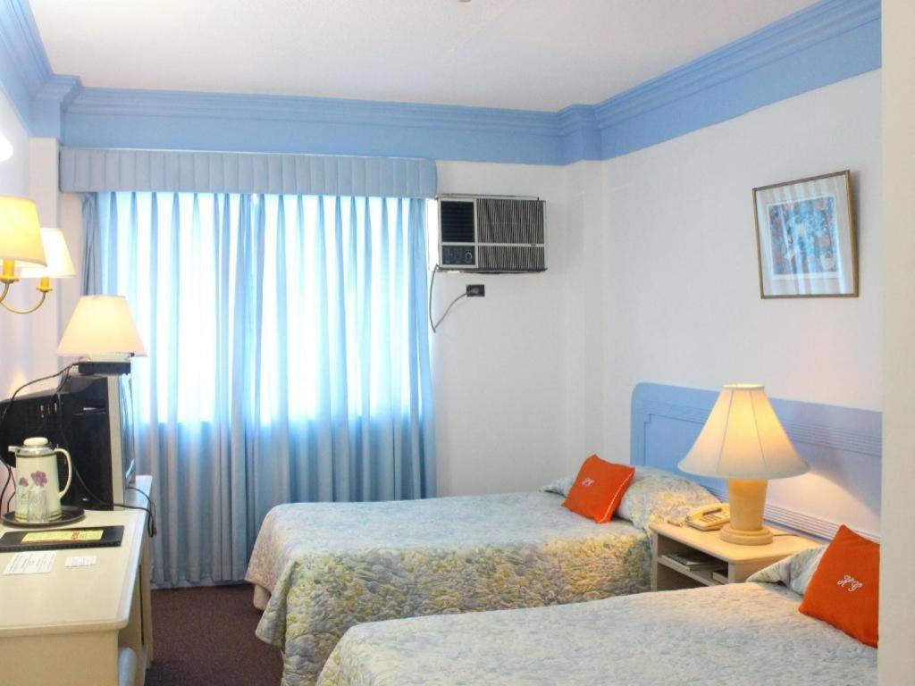 Hotel Galleria Davao Bagian luar foto